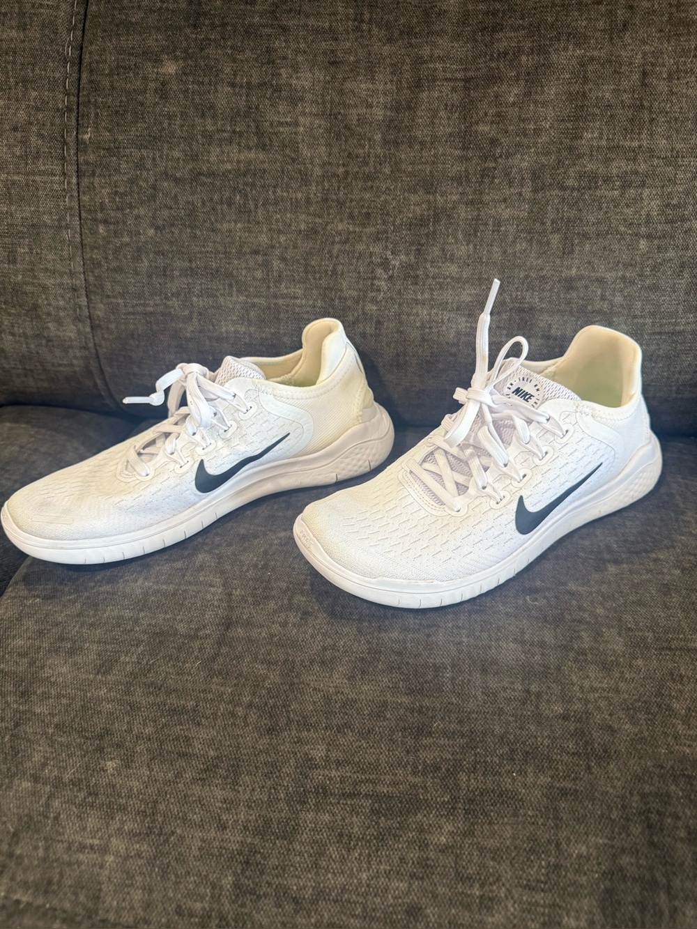 Nike White Kids Sneakers with Black Swoosh